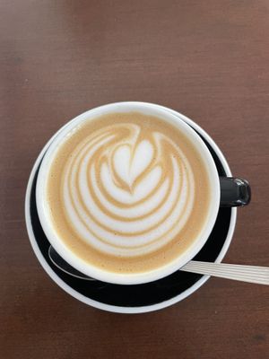 Cafe con leche with oat milk   at Los Picos Café in Valencia