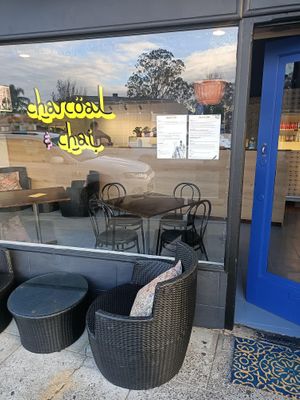 Outdoor seating at Charcoal and Chai in Como