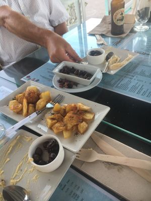 Hummus (best humous ever) &  olives & fresh bread and spiced potatoes  at Manumaga in Mojacar