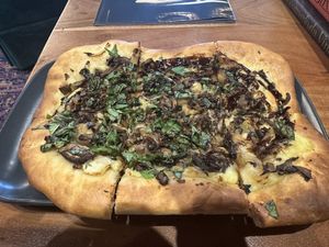 This was a caramelized onion and mushroom pizza with a balsamic reduced glaze.  Really… Really good!   at Vegetation Plant Food in Lakeland