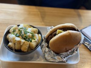 Black bean burger and loaded tots  at Vegetation Plant Food in Lakeland