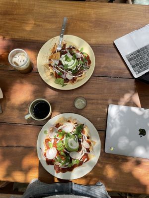 Vegan chilaquiles with red sauce and vegan cream   at Tierra in Tulum