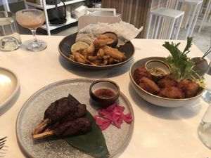 Miso adobo brochettes + jalapeno poppers + calamaries at Casa Kaizen in Montreal