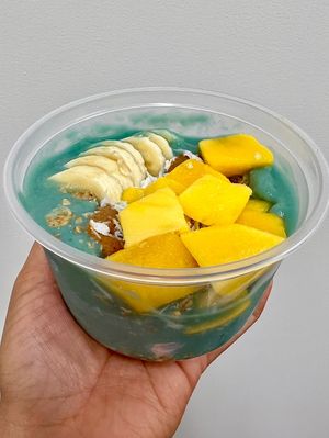 The Belize smoothie bowl with mango, banana, coconut and almond butter. Yum!  at Glo Juice Bar + Cafe in Dayton