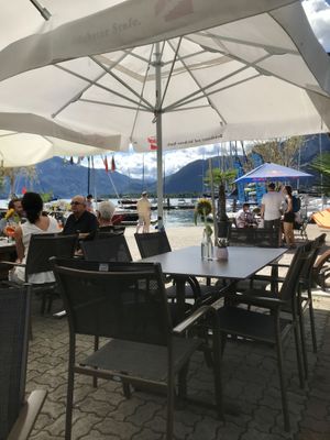 Relaxed outdoor seating by the lake   at Naked Flowers in Mondsee