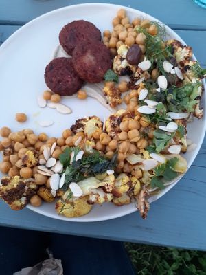 Roasted cauliflower and fennel with curried chickpea and falafel. at L'abri in Cheticamp