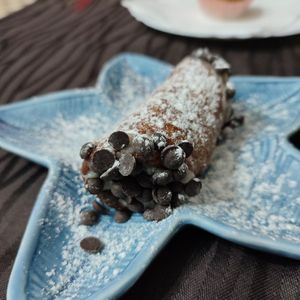 Cannolo filled with banana and coconut at Trinacria in Samarate