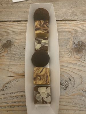 From the take away christmas menu: Mini bites. One cacao-date, one spicy pumpkin and one with speculaas kruiden and almonds.   at The Green Room - Cityhotel Wood in Middelburg