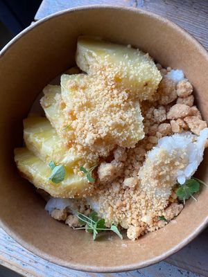 Coconut rice pudding with ster anise, grilled pineapple and a white chocolate cookie crumble. at The Green Room - Cityhotel Wood in Middelburg