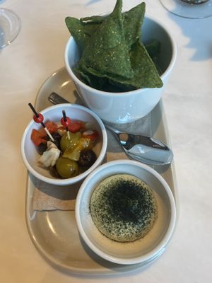 Seaweed tortilla chips with avocado hummus. at The Green Room - Cityhotel Wood in Middelburg