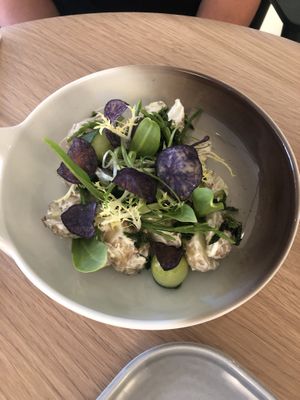 Potato salad with sea vegetables, purple potato chips, cucumber and a muster dressing.  at The Green Room - Cityhotel Wood in Middelburg