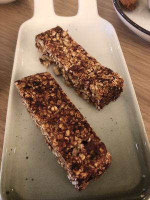 Homemade mueslibars we got with our coffee. at The Green Room - Cityhotel Wood in Middelburg