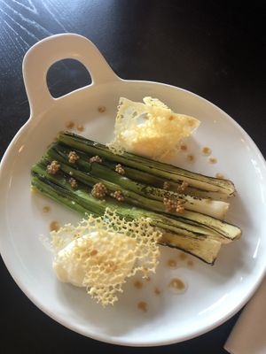 Vegetarian, not vegan, dish from my table companions! Local grown grilled leek with musterd seeds, a dressing of soja and miso, and a mouse and crisp of cheese.  at The Green Room - Cityhotel Wood in Middelburg