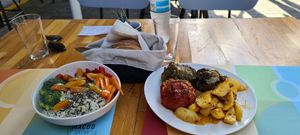 Iron Bowl, bread, stuffed peppers with potatoes at Macoo Eatery in Crete