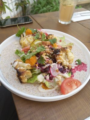 whole wheat wrap with roasted cauliflower & smoked tempeh at Circus Restaurant in Antwerpen