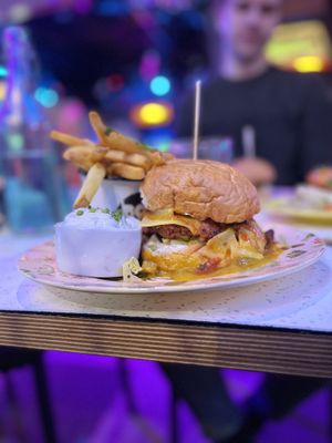 Wild wild mess burger with tzatziki and fries  at HOAX in Tampere