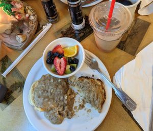 Vegan biscuit and vegan sausage gravy with side of fruit.  Justin smoothie with almond milk. at Hibiscus Cafe in Grayton Beach