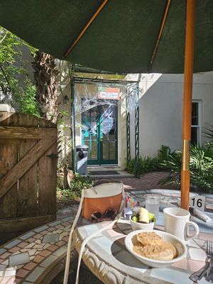 Outside eating in beautiful setting at Hibiscus Cafe in Grayton Beach