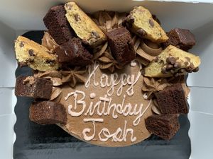 A custom birthday cake for my hubby! He LOVES chocolate chip cookies and brownies — can you tell? at Emy Delights & Bites - Pop Up in Hyde Park