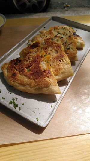 Pies from Rhodes island stuffed with potatoes in Indian spices at The Vegan Vandal in Athens