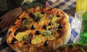 Vegan cheese, olives, dried tomatoes, potatoes  at Tom 'n' Jerry in Berlin