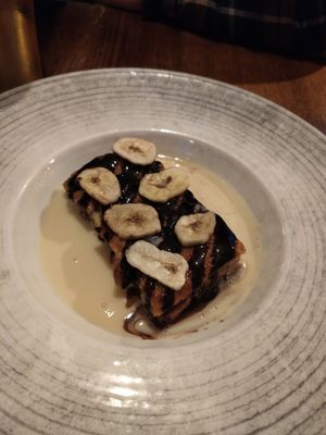 Vegan banana breadpudding with vegan custard. at Abbey Hotel in Battle