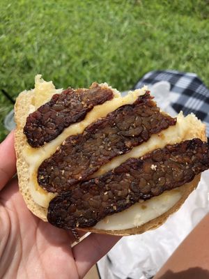 Breakfast sandwich with Just Egg, vegan cheddar, tempeh bacon on a kaiser roll. Delicious! at Bonafide Bakeshop & Cafe in Apex