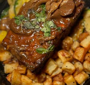 Vegan Meatloaf with mushroom gravy, roasted potatoes, and vegetables at 600 Kitchen and Bar in Kalamazoo