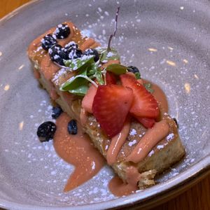 Sweet Corn Cake: Guava-Coconut Sauce, Fresh Strawberries & Blueberries at 600 Kitchen and Bar in Kalamazoo
