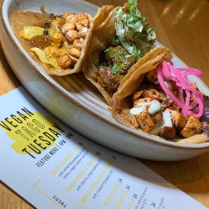 Tacos: Aji Amarillo Roasted Artichokes, Birria Brussels Sprouts, Crispy Seasoned Tofu.  From Vegan Taco Tuesday 12/12/23 (every 2nd Tuesday of the month) at 600 Kitchen and Bar in Kalamazoo