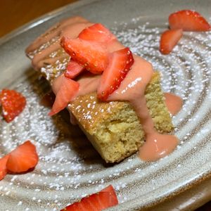 Sweet Corn Cake: Guava-Coconut Sauce, Fresh Strawberries.  From Vegan Taco Tuesday 12/12/23 (every 2nd Tuesday of the month) at 600 Kitchen and Bar in Kalamazoo