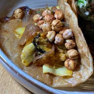 Aji Amarillo Roasted Artichokes Taco w/ Roasted Chickpeas.  From Vegan Taco Tuesday 12/12/23 (every 2nd Tuesday of the month) at 600 Kitchen and Bar in Kalamazoo