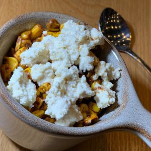 Elote Cup: Yellow Corn, Miso Broth, Mild Chili Powder, Vegan Queso Fresco.  From Vegan Taco Tuesday 12/12/23 (every 2nd Tuesday of the month) at 600 Kitchen and Bar in Kalamazoo