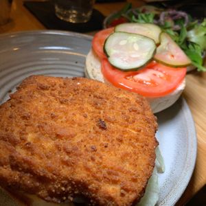 "No Harm, No Fowl" Vegan Fried Chick'n Sandwich:  Lettuce, Tomatoes, Pickles, Dijonnaise, optional Vegan Bun. With Side Salad (+$1.50) at 600 Kitchen and Bar in Kalamazoo