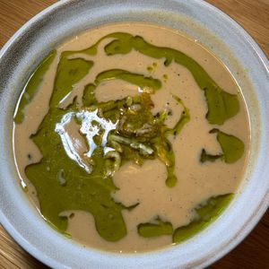 Parsnip Leak Bisque (Bowl): CCA Parsnips, Chive Oil, Coconut Milk, Fried Onions at 600 Kitchen and Bar in Kalamazoo