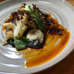 Stuffed & Roasted Poblano Peppers:  Refried Beans, Charred Cauliflower, Salsa Matcha, Jalapeño Aioli.  From Vegan Taco Tuesday 2/13/24 (every 2nd Tuesday of the month) at 600 Kitchen and Bar in Kalamazoo