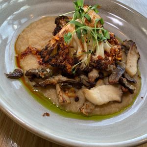 Cauliflower:  Roasted Wedge, Harissa, Soy, Chili Flakes, Parsnip Puree.  OMIT Honey to make it Vegan at 600 Kitchen and Bar in Kalamazoo