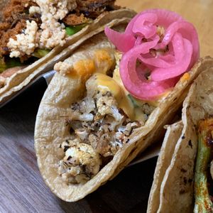 Miso-Mashed Sweet Potato Taco: Garlic & Thyme Roasted Cauliflower, Gochujang Aioli, Pickled Onions.  From Vegan Taco Tuesday 7/9/24 (every 2nd Tuesday of the month) at 600 Kitchen and Bar in Kalamazoo