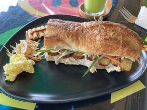 Banh mi with smoked tofuu  at Juice From Mars in Takua Pa