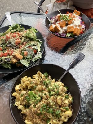 baked mac ‘n cheese, caesar salad and buffalo tempeh bowl ✨  at Organic Garden Cafe in Beverly