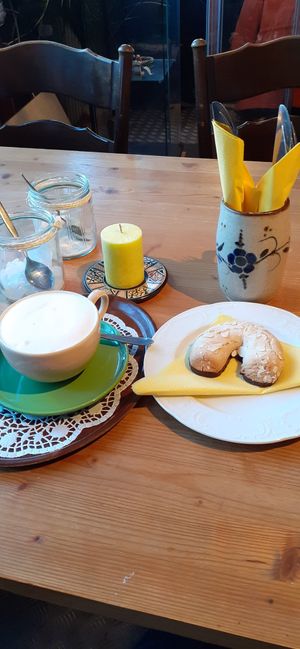 Mandelhörnchen und Cappuccino at Fair Cafe in Schortens