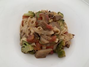Vegan pasta with broccoli, mushrooms, and pine nuts at Posada Margherita in Tulum