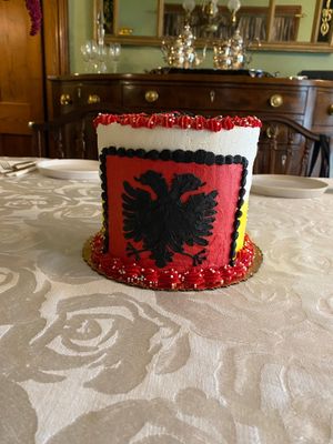 Side of cake features Albanian double-headed eagle  at Cakerino in Troy