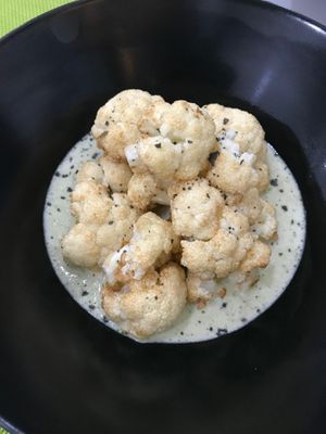 Coliflor frita con salsa de puerro y coco. at Plantae Gastrobar  in Tenerife