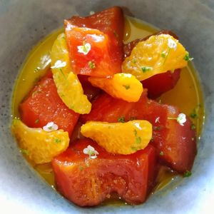 Papaya asada y especiada con mandarina y mango at Plantae Gastrobar  in Tenerife