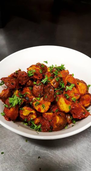 Bravas de papas negras con mojo picon at Plantae Gastrobar  in Tenerife