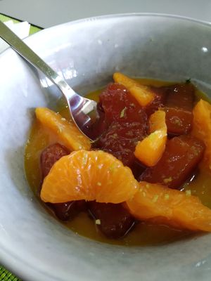 Papaya asada y especiada con mandarinas y mango at Plantae Gastrobar  in Tenerife