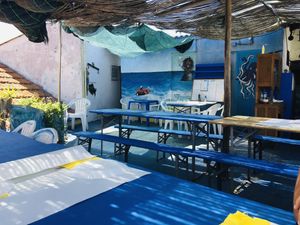 Espaço de refeições no exterior at O Melidense in Melides
