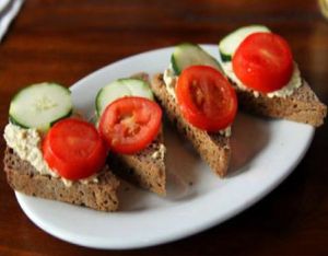 toast: new cascadia teff bread (gluten-free) with zucchini hummus, cucumber and tomato. at Prasad - Pearl District in Portland