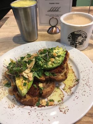 Avocado toast, juice, and a latte  at Prasad - Pearl District in Portland
